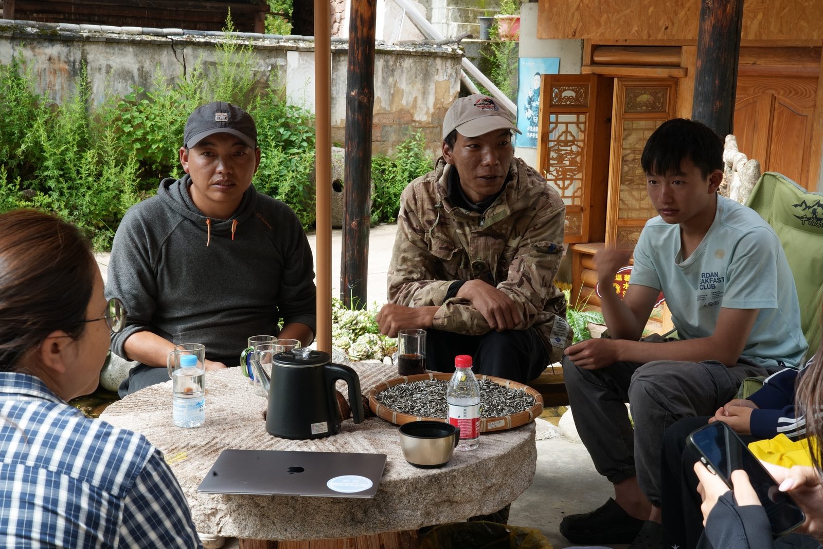 A field conversation with residents in a Liju courtyard